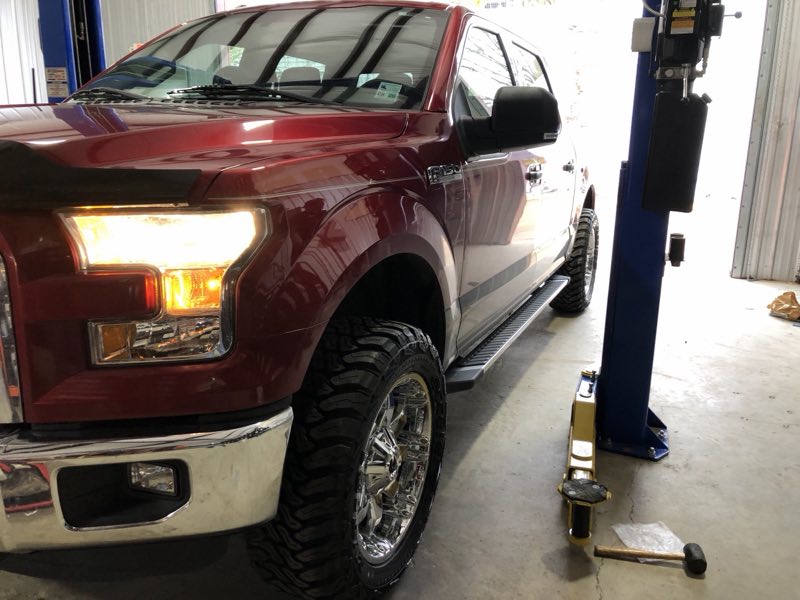 D-MAX wheel and tire work in the shop bay